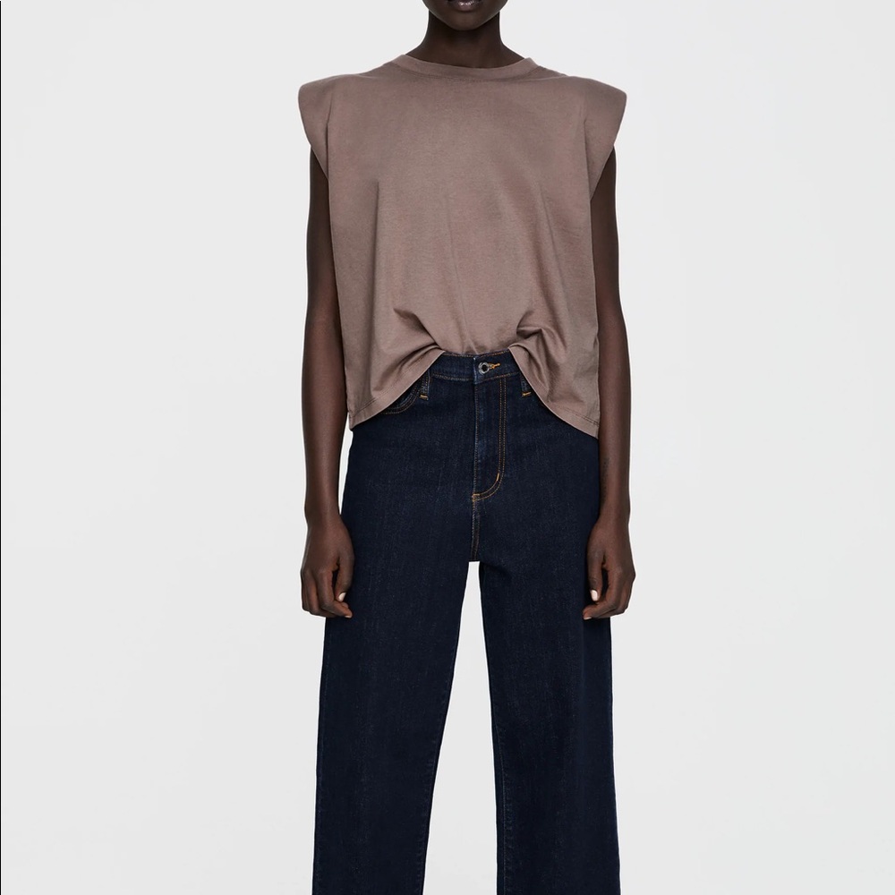 Shoulder Padded t shirt in size S